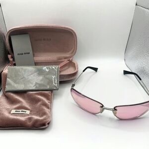 Miu Miu Pink Rimless Cateye Sunglasses with Silver Accents